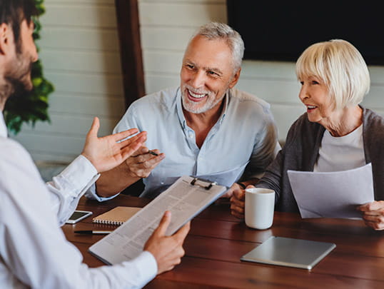 Couple getting advice on how to invest their tax refund