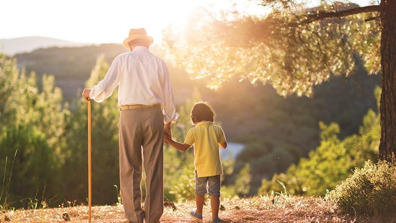 Grandparent walking with grandchild