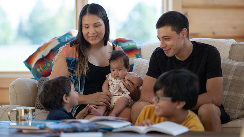 Native American family discussing buying a new home